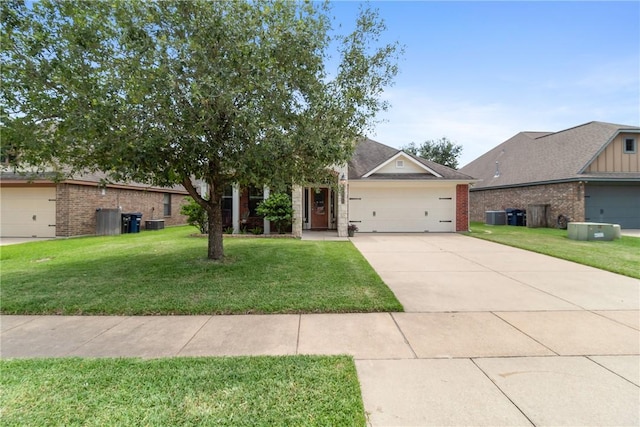 4205 Cripple Creek Ct, College Station, TX 77845 - view of front facade featuring brick siding, an attached garage, a front yard, and driveway