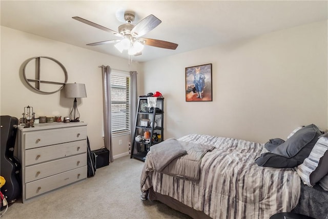 4205 Cripple Creek Ct, College Station, TX 77845 - bedroom with light colored carpet, a ceiling fan, and baseboards