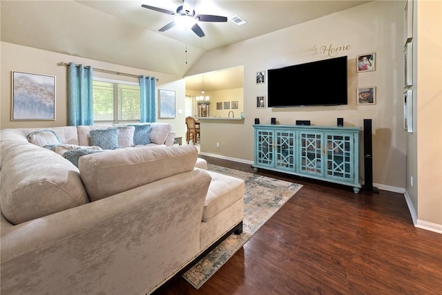 living room featuring ceiling fan, dark hardwood / wood-style flooring, and vaulted ceiling