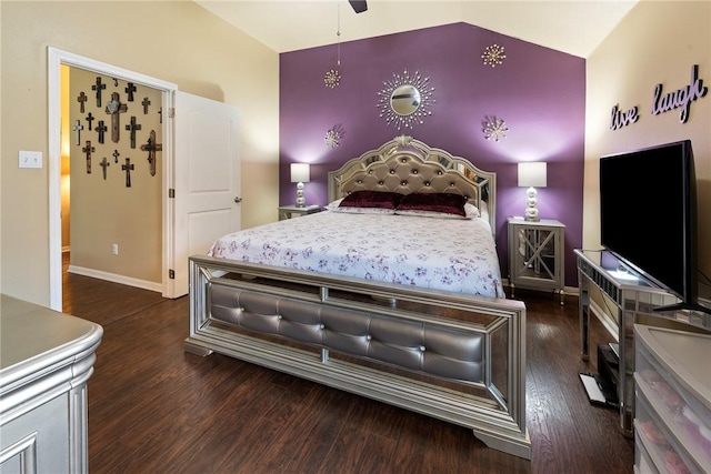 bedroom featuring lofted ceiling and dark hardwood / wood-style flooring