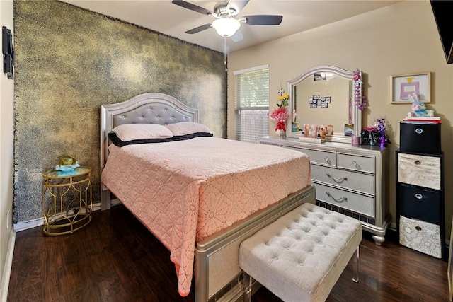 bedroom with dark wood-type flooring and ceiling fan