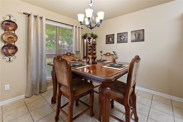 tiled dining space with an inviting chandelier