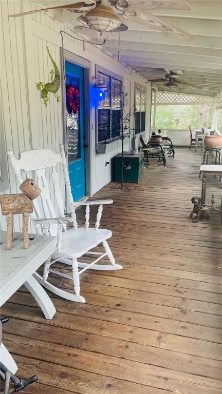 wooden deck with ceiling fan