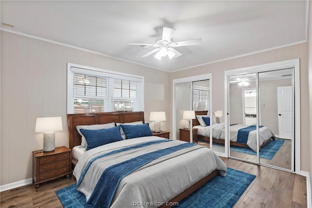 bedroom with hardwood / wood-style flooring, ceiling fan, and ornamental molding