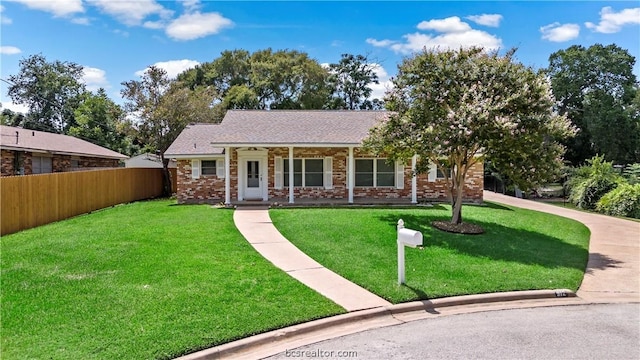 view of front of home with a front lawn and covered porch