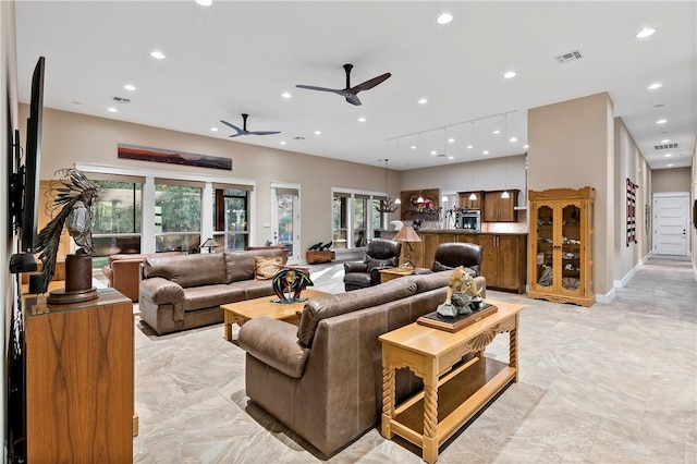 living room with ceiling fan