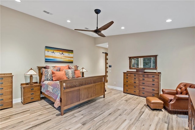 bedroom featuring ceiling fan and light hardwood / wood-style floors