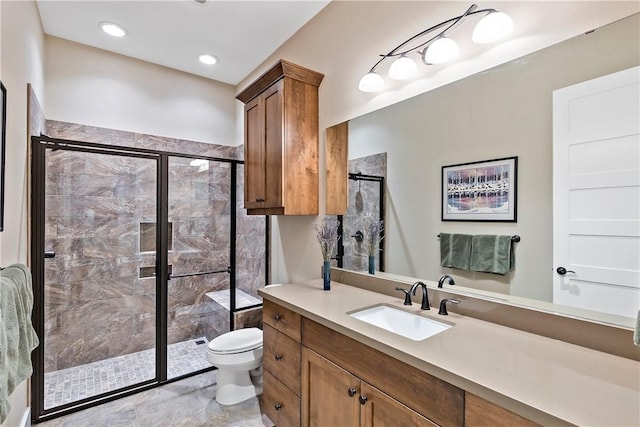 bathroom featuring vanity, toilet, and walk in shower