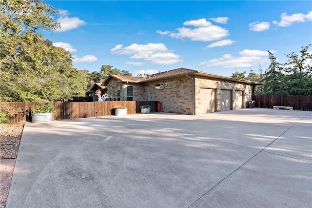 view of property exterior featuring a garage