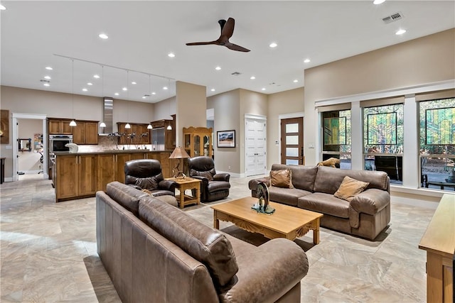 living room featuring ceiling fan