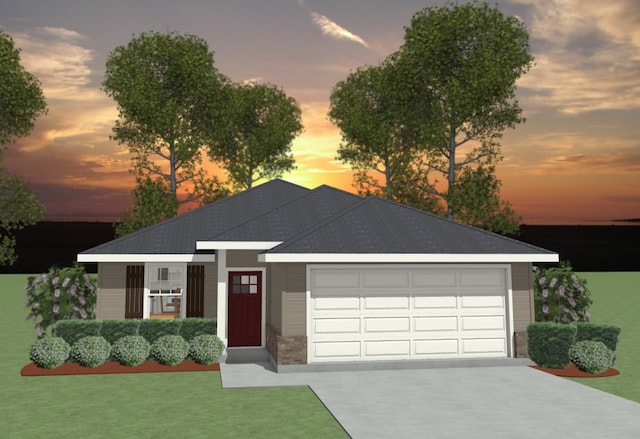 view of front of property featuring a garage, concrete driveway, and a lawn