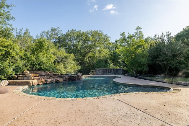 17288 Indian Lakes Dr, College Station, TX 77845 - swimming pool featuring a patio and view of wooded area
