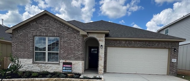 view of front of house with a garage