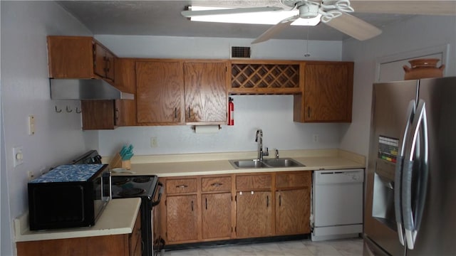 kitchen featuring stainless steel refrigerator with ice dispenser, ceiling fan, sink, dishwasher, and black electric range oven