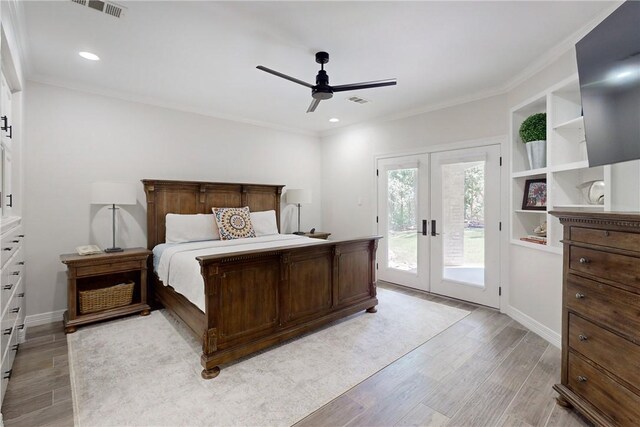 bedroom with access to outside, ceiling fan, french doors, and crown molding