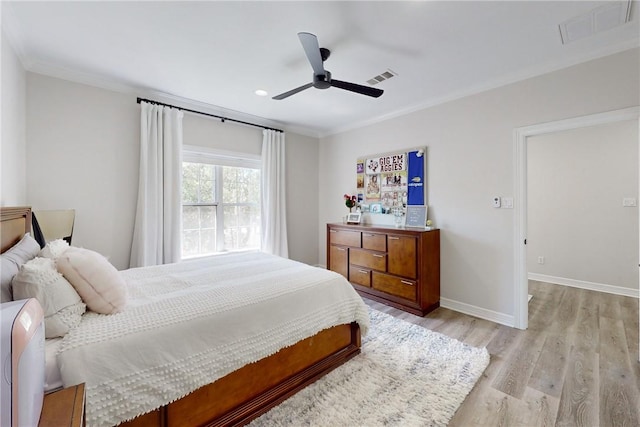 bedroom with ceiling fan, light hardwood / wood-style flooring, and ornamental molding