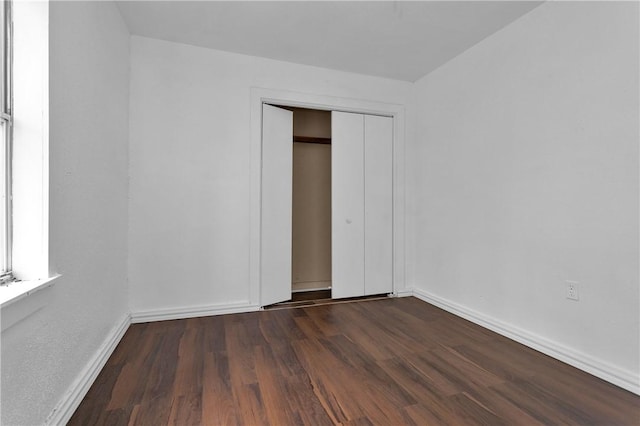 4794 Tall Pine Rd, Navasota, TX 77868 - unfurnished bedroom featuring wood finished floors and a closet