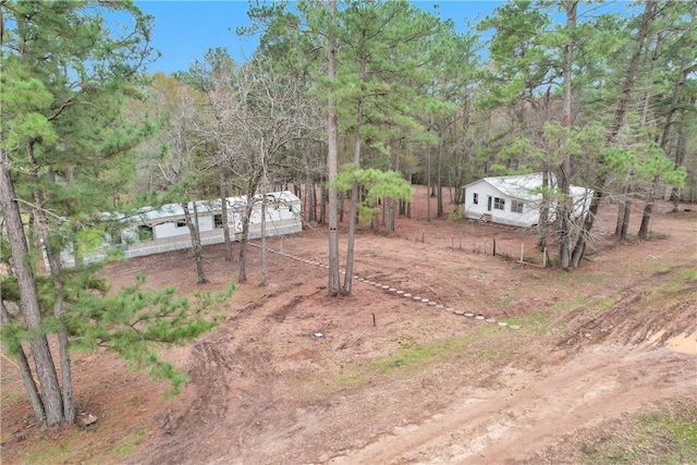 4794 Tall Pine Rd, Navasota, TX 77868 - view of yard with a forest view
