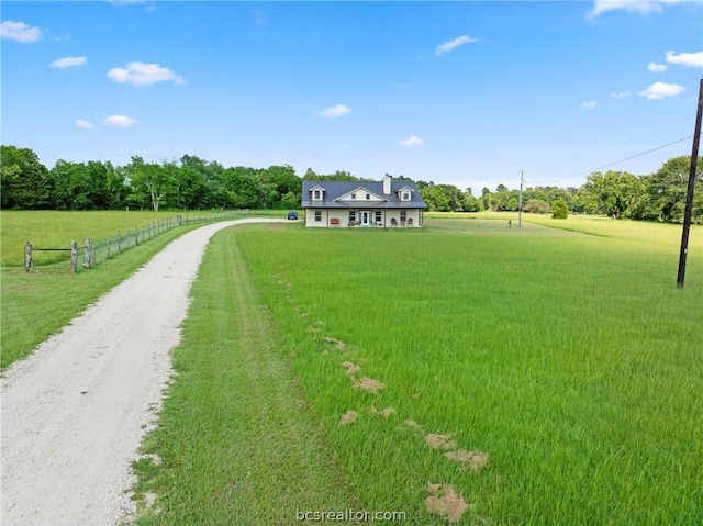 exterior space with a rural view