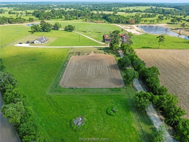 aerial view featuring a rural view and a water view