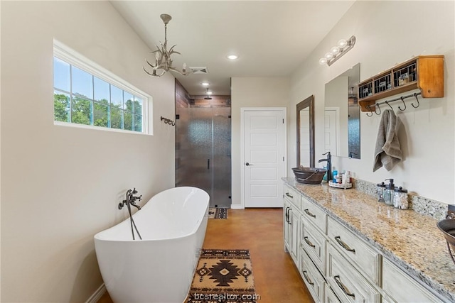 bathroom featuring a notable chandelier, vanity, concrete flooring, and independent shower and bath