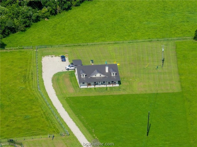 birds eye view of property featuring a rural view