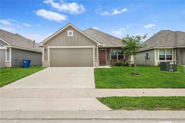 view of front facade featuring a garage, a front lawn, brick siding, board and batten siding, and concrete driveway