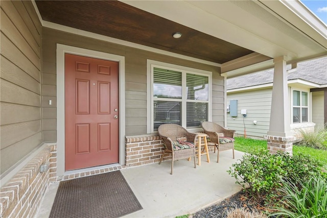 entrance to property with covered porch
