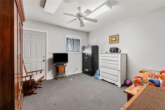 bedroom featuring a ceiling fan, baseboards, and carpet floors