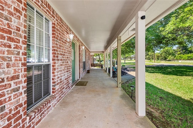 view of patio featuring a porch