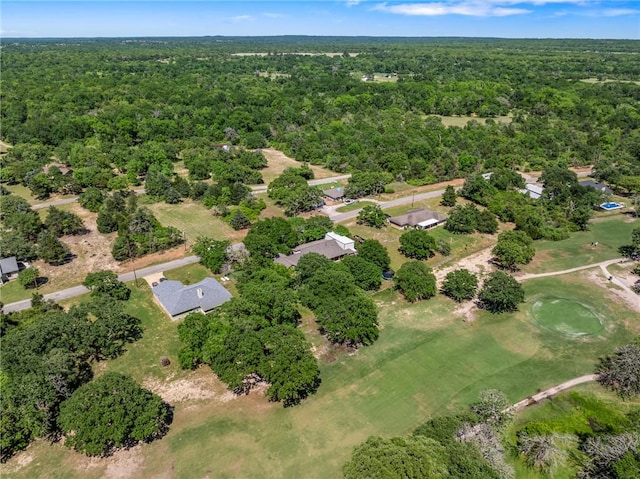 drone / aerial view with a view of trees