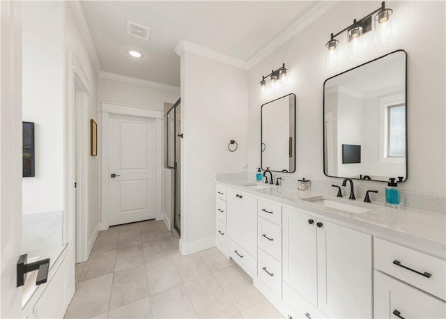 bathroom featuring a sink, visible vents, a stall shower, and ornamental molding