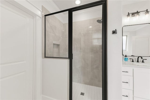 bathroom with vanity and a shower stall