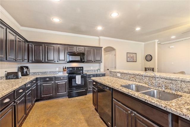 kitchen with black appliances, dark brown cabinets, crown molding, and sink