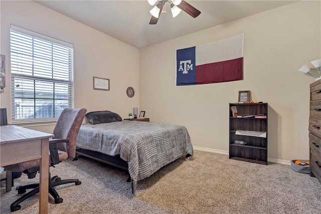 carpeted bedroom featuring ceiling fan