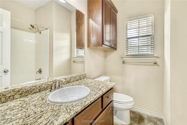 full bathroom with vanity, toilet, and shower / bath combination