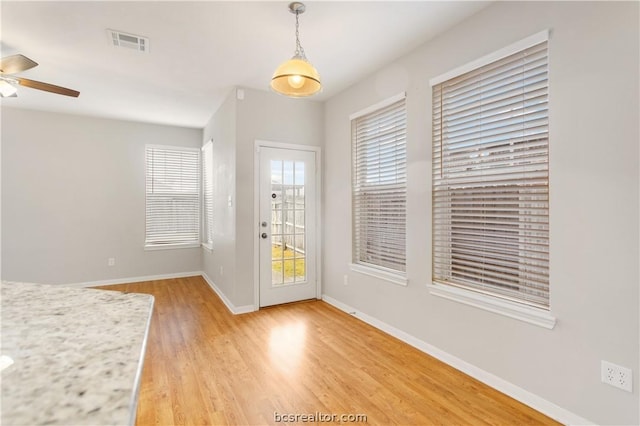 entryway featuring ceiling fan and light wood-type flooring