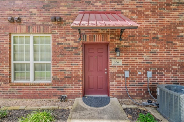 801 Luther St W Unit 106, College Station, TX 77840 - view of exterior entry with brick siding