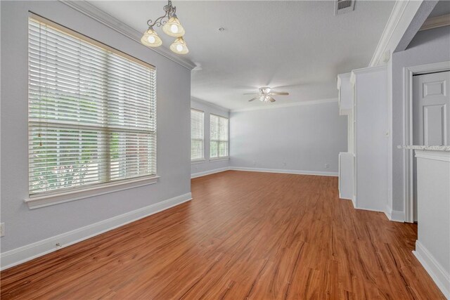 801 Luther St W Unit 106, College Station, TX 77840 - empty room featuring crown molding, a ceiling fan, and light wood-type flooring