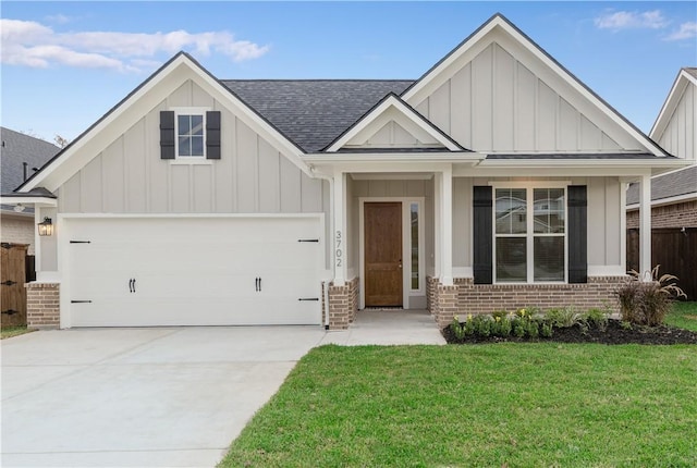 3702 Archer Falls Ct, College Station, TX 77845 - craftsman-style house with board and batten siding, brick siding, a shingled roof, and an attached garage