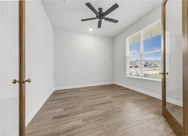 3702 Archer Falls Ct, College Station, TX 77845 - empty room featuring light wood-style flooring, ceiling fan, and recessed lighting