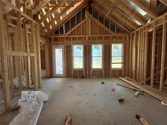 misc room with lofted ceiling