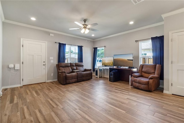 living room featuring light hardwood / wood-style flooring, ceiling fan, and ornamental molding