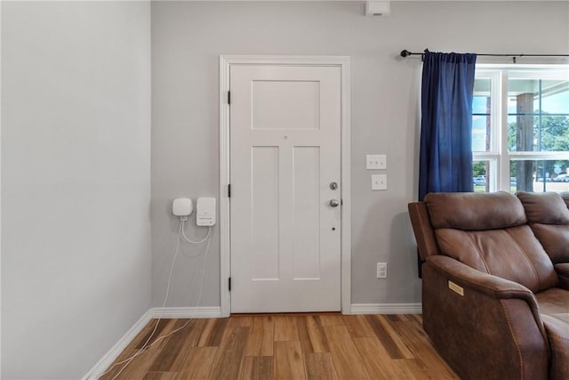 entryway with light hardwood / wood-style flooring