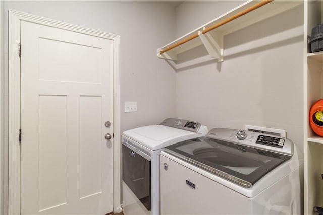 laundry room with washer and dryer