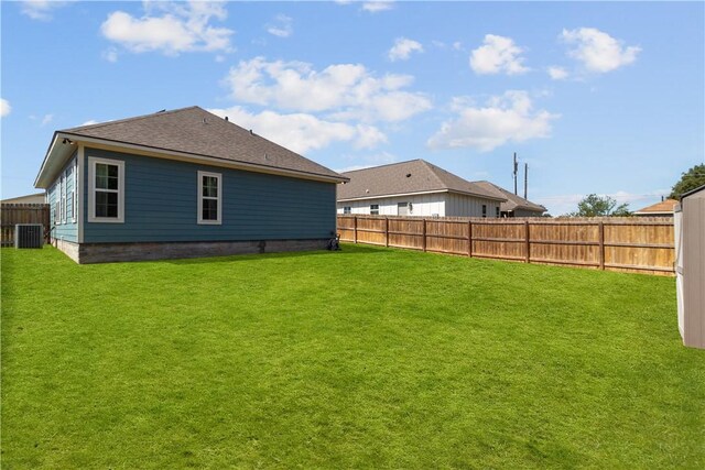 view of outbuilding with a yard