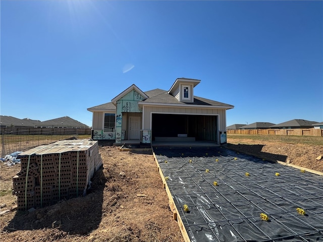 property under construction with a garage