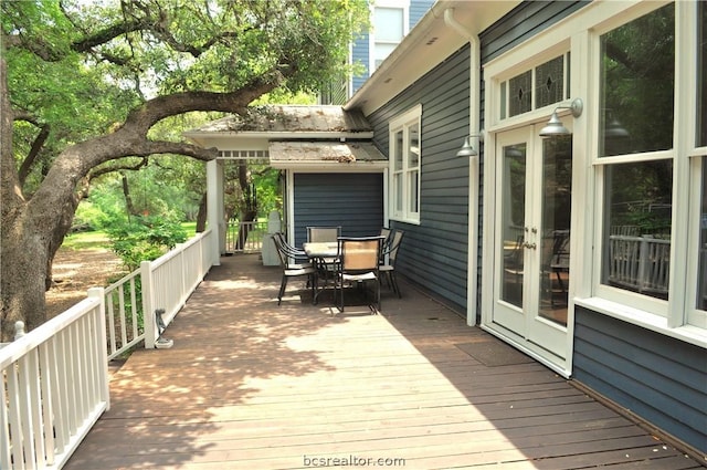 wooden terrace featuring french doors