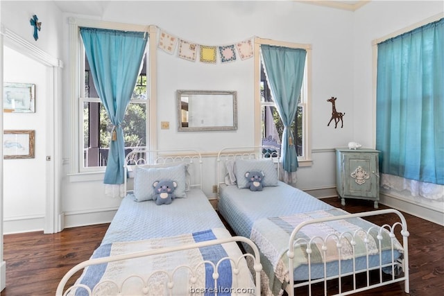 bedroom featuring dark hardwood / wood-style floors