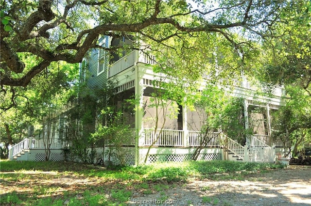 view of home's exterior featuring a sunroom